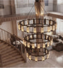 Non-standard custom chandelier in bronze finish with cast glass, made to order by RODESIGNE