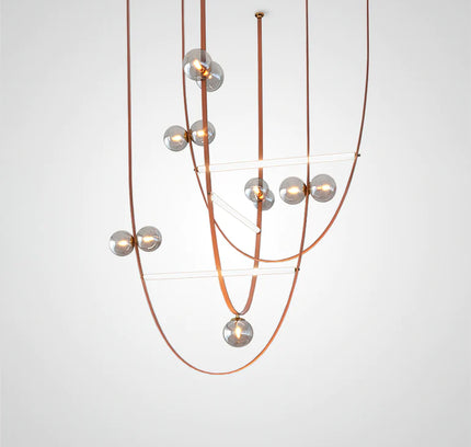 Chandelier BELT LEATHER by Rodesigne — brass designer chandelier, custom lighting by RODESIGNE