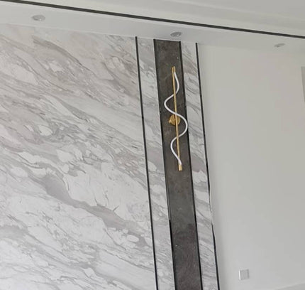 Wall Sconce TRACER TWISTED — brass wall sconce lamp, designer lighting by RODESIGNE