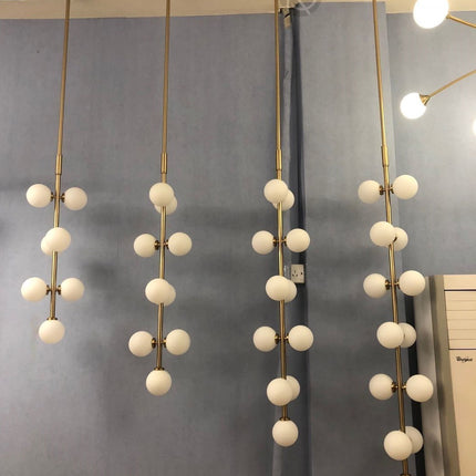 Chandelier SOSPESO by Rodesigne — brass designer chandelier, custom lighting by RODESIGNE